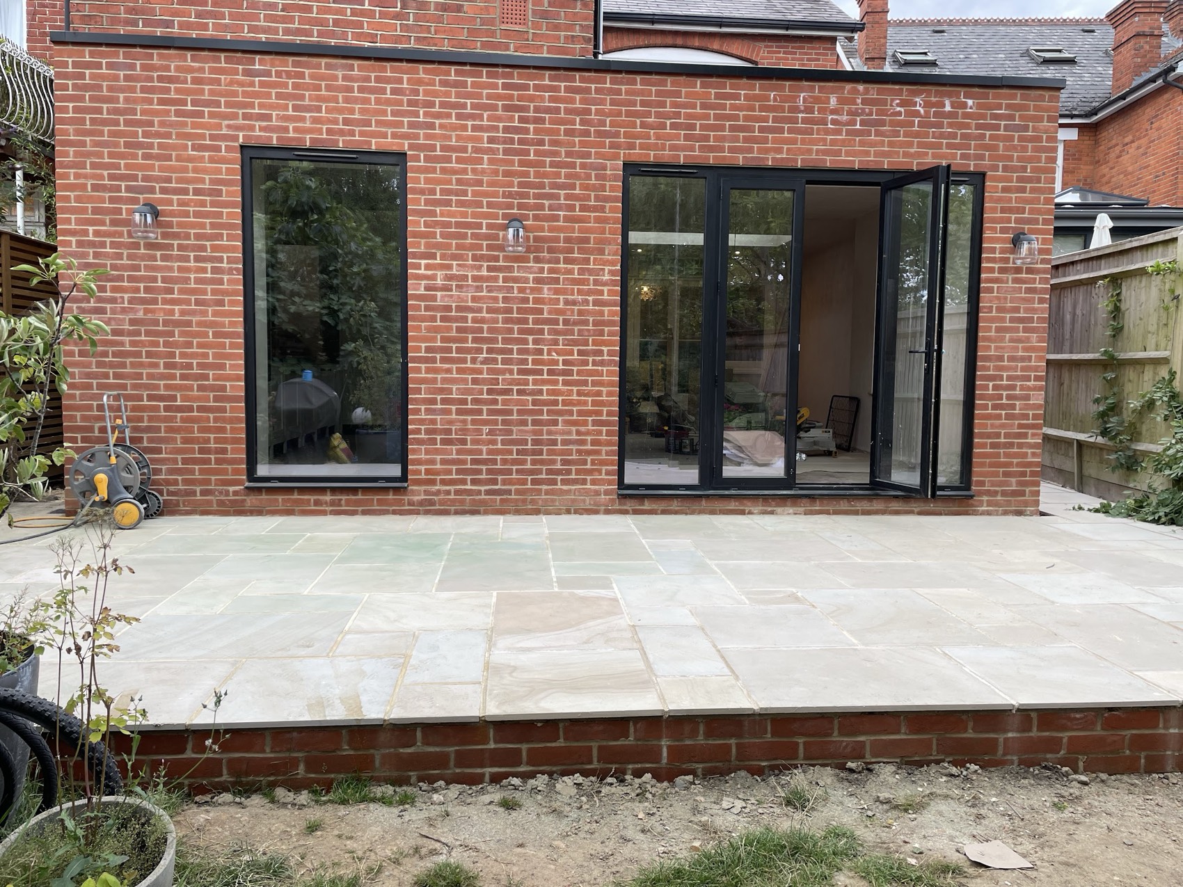 Single-storey rear extension and patio
